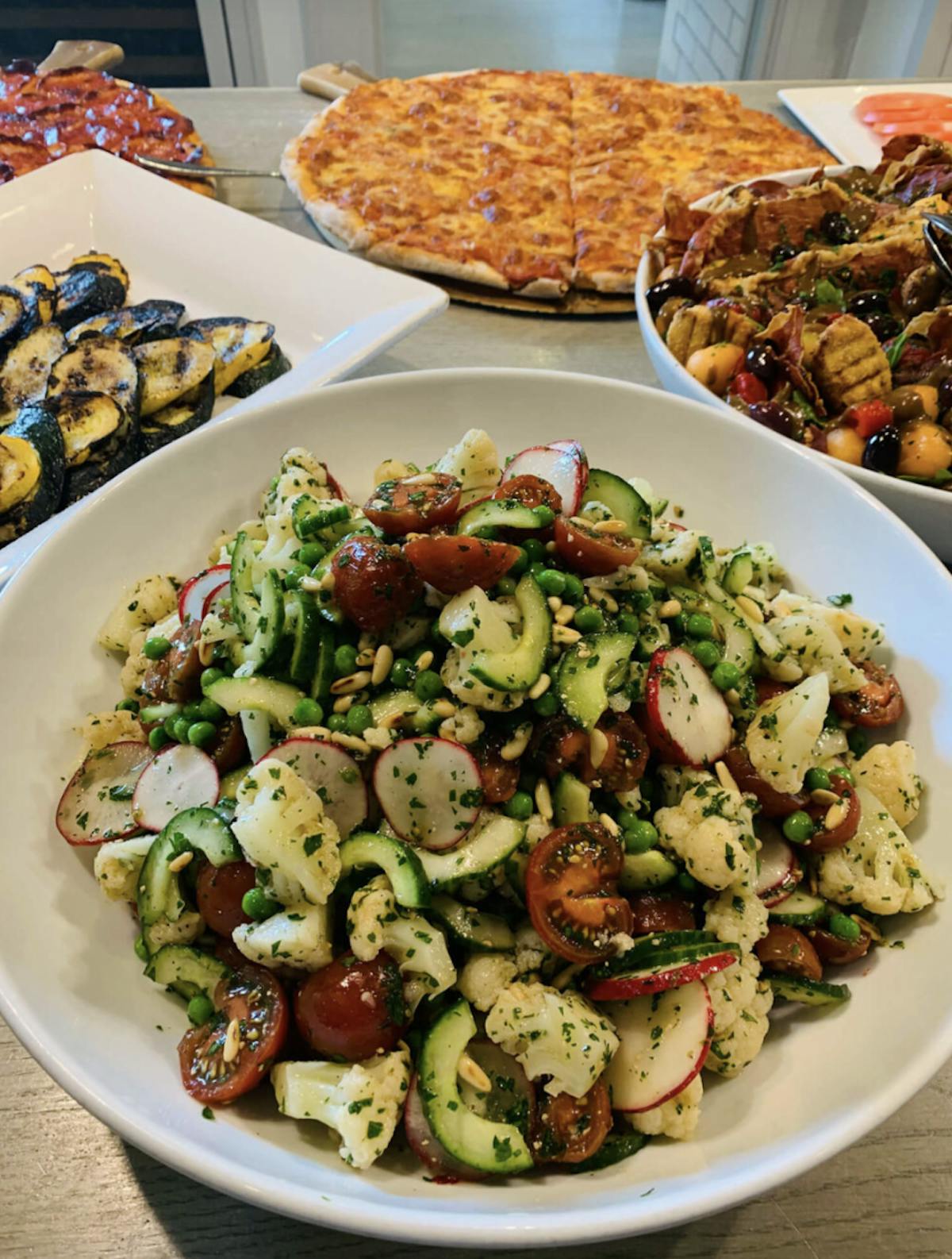 a bowl filled with different types of food on a plate